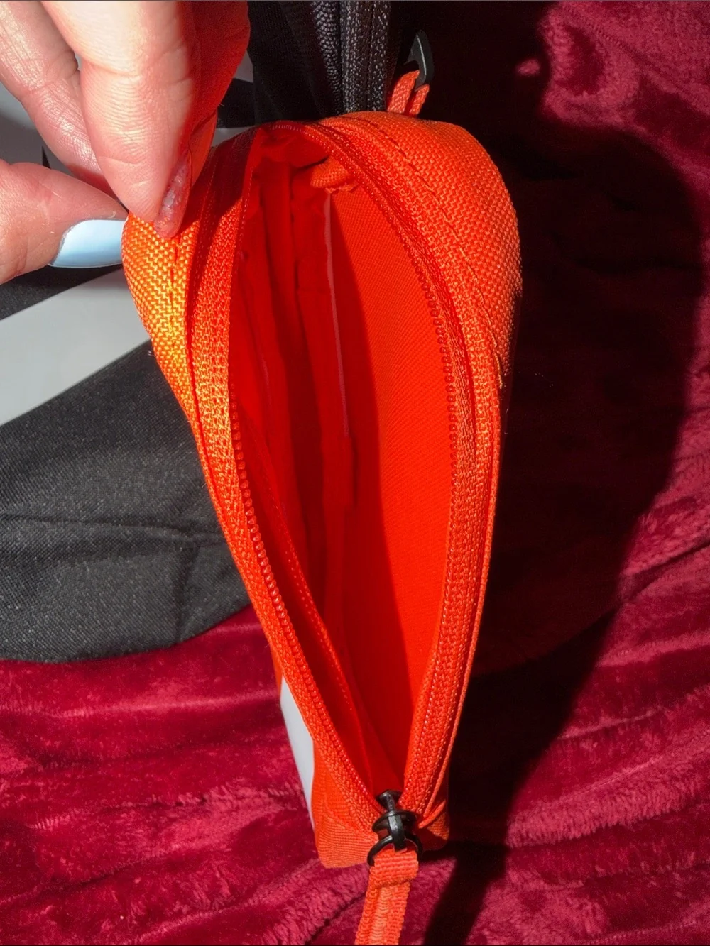 Nike Black Backpack with White Logo and Orange Pouch